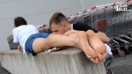 Foot voyeur at parking lot